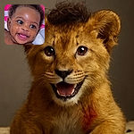 A joyful baby with sparkling eyes and a wide smile enjoys a bubbly bath, water droplets glistening on their skin, with a bright pink bath toy in the background adding a pop of color.