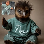 A cheerful toddler with curly hair is sitting on a wooden floor, wearing a matching green outfit with white bows and the word 'Paris' on the shirt. The child appears to be reaching out with a playful expression, surrounded by some baby gear and toys in the background.