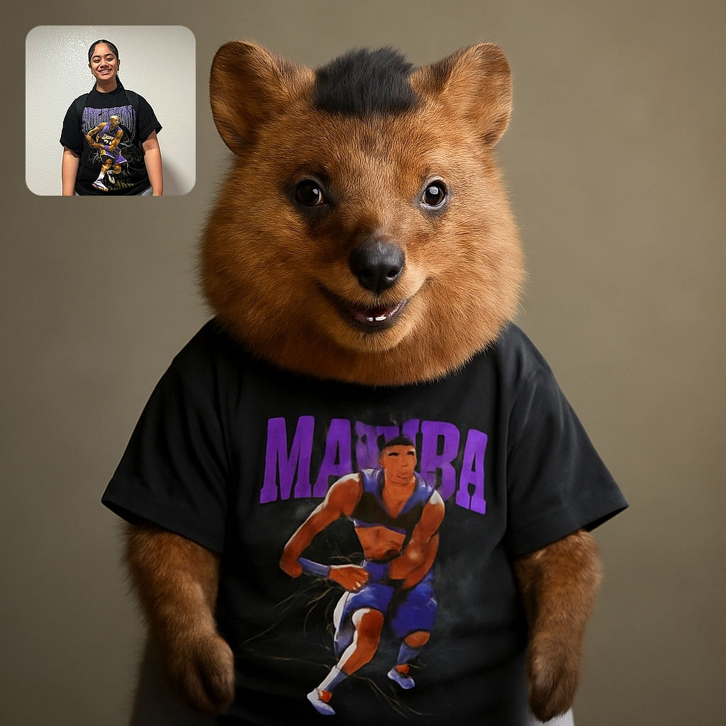 A cheerful young person stands confidently against a plain wall, wearing a bold Kobe Bryant graphic t-shirt and gray sweatpants, radiating positive vibes with a bright smile and relaxed pose.