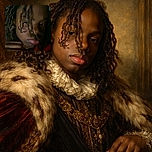 A dimly lit close-up portrait of a child with dreadlocks partially covering their face, wearing a red shirt and holding their hand near their chin, creating a moody and introspective vibe.