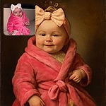 A cheerful baby wrapped snugly in a fluffy pink robe with a large bow headband, sitting comfortably on a beige couch, flashing a sweet smile that could melt hearts.