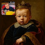 A curious baby lying on a colorful play mat, propped up on a striped pillow with a large yellow plush toy in the foreground, eyes wide open as if discovering the world for the first time.