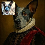 A happy dog with big ears and bright eyes smiles widely at the camera, standing outside on a sunny, gravelly ground with a chain-link fence and some garden items blurred in the background.