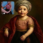 A cheerful baby wearing a colorful head wrap and a pink shirt that says 'I love my mommy' is standing against a wall, dressed in a sparkly black skirt. An older child is partially visible, playfully holding the baby to steady them. The photo has a cozy indoor vibe with a playful timestamp and heart graphic overlay reading 'Friday 7:27 PM'.