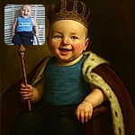 A happy baby lies on a crocheted blanket, wearing a blue sleeveless shirt with a funny slogan and black pants, smiling with an open mouth as if caught mid-laugh.