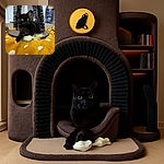 A sleek black cat lounges comfortably on a yellow polka-dot blanket, pawing at a feathered toy beneath a unique arch-shaped scratching post. The background shows a cozy room with a vacuum cleaner and a door, adding a homey vibe to this candid feline moment.