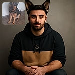 A loyal German Shepherd sits attentively on a wooden floor against a plain white wall, ears perked up and eyes full of curiosity, ready for a command or a treat.