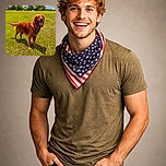 A happy golden retriever wearing a colorful bandana stands proudly on a sunny green field with a bright blue sky and fluffy clouds in the background, tongue out and ready for fun.