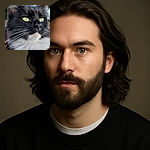 A majestic close-up of a tuxedo cat with striking yellow eyes looking off into the distance, showcasing its sharp white whiskers and fluffy chest fur against a softly blurred autumnal background.