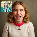 A fluffy white dog with adorable tan ears and a bright pink collar sits happily on a shiny green slide, tongue out and eyes sparkling, ready for a playground adventure.