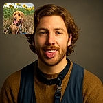 A happy, slightly muddy golden retriever puppy sits in tall dry grass with a backdrop of bright yellow sunflowers, tongue out and looking content, capturing a perfect sunny day adventure vibe.