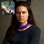 A majestic long-haired cat with a purple collar sits proudly on a worn car seat, illuminated by bright sunlight streaming through the window, with green trees visible outside and purple reflections casting a magical glow on the seat.