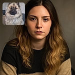 A majestic fluffy dog with a thick coat sits patiently on a couch, gazing directly into the camera with soulful eyes, surrounded by a soft, blurred background that highlights its regal fur and expressive face.