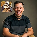 A cheerful dog is comfortably sitting on a white metal chair amidst a yard covered in autumn leaves, with an old red car and scattered outdoor furniture in the background. The dog looks like it's smiling for the camera on a sunny day.
