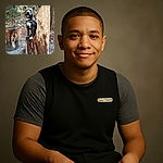 A happy dog with a shiny coat and a harness is perched like royalty on a carved wooden stump throne in a forest setting, tongue out and looking ready to rule the woodland kingdom.