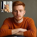 A regal ginger cat lounges on a windowsill bathed in soft natural light, paws stretched out over a stack of notebooks, looking like the boss of the home office with a slightly unimpressed but majestic stare.