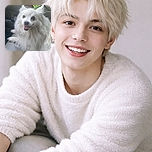 A fluffy white dog with a bright green bow on its head smiles happily while lounging on a car seat, looking like the happiest co-pilot ever ready for an adventure.
