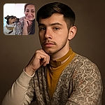 A cozy snapshot of a woman smiling gently while her attentive dog looks up at her, both sharing a quiet moment on a patterned couch with soft natural lighting.