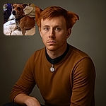 A curious small brown dog with a collar sits on a cozy white blanket, eyes wide and alert, with a chew stick in front of its paws. The background shows a cluttered side table and a cheerful sunflower drawing pinned to the wall, adding a touch of homely charm.