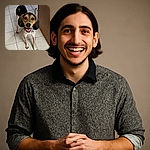 A happy, attentive dog with big floppy ears and a spotted coat stands on a tiled floor looking up with bright, eager eyes and a wide smile, as if ready for a game or a treat.