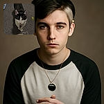 A curious black and white cat named Crumbs looks up with bright eyes, standing on a textured carpet next to a cozy paw-print mat and a small yellow toy spring, with a playful heart doodle overlay adding a touch of affection.