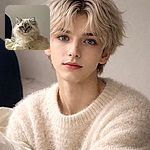 A fluffy blue‑eyed kitten stares at the camera like it’s practicing for royalty auditions — ruffly mane, tiny whiskers, and a neutral wall backdrop that says ‘less is more’ while the bed sheet provides an ad‑hoc throne.