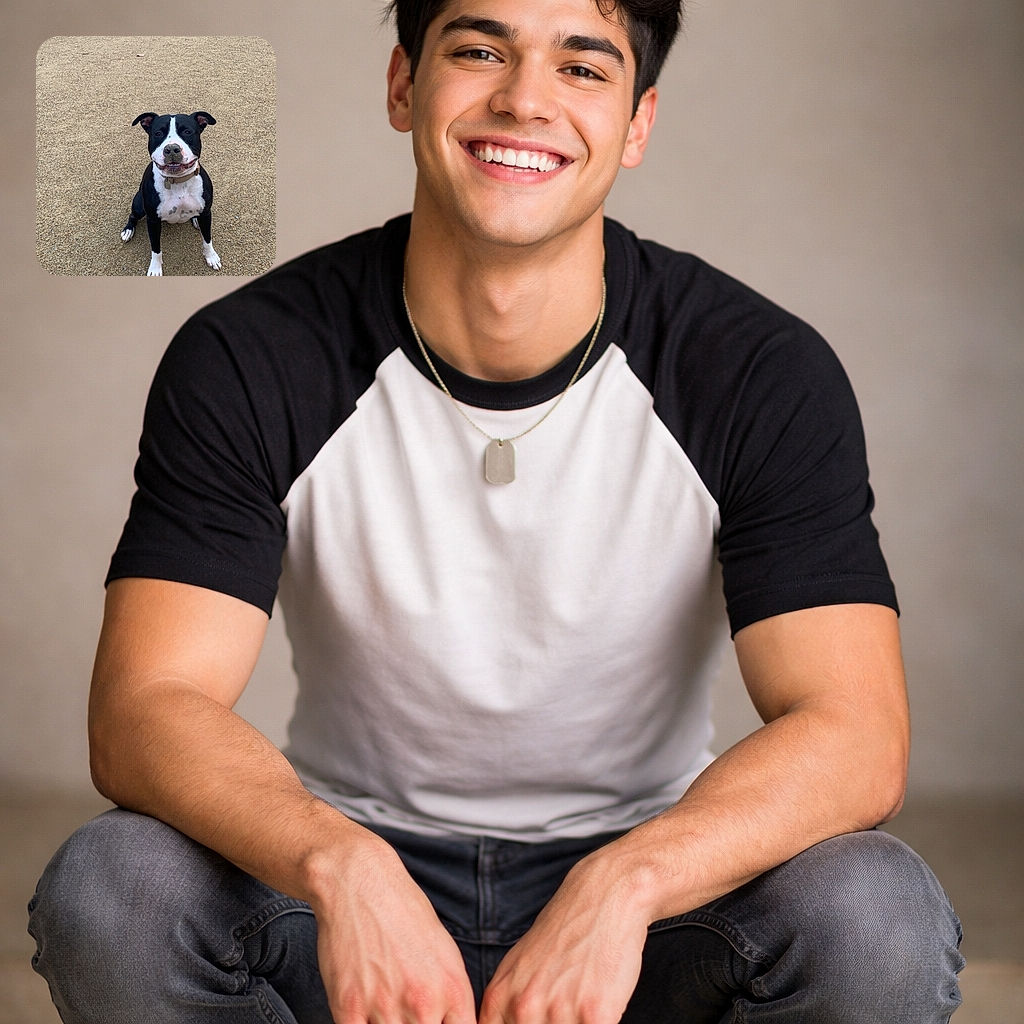 A sandy-nosed black-and-white dog sits center-frame on a wide stretch of beach, grinning with a sand-speckled snout and eager eyes — clearly proud of whatever prehistoric treasure it just dug up. The empty sandy background makes this pup the undeniable star of the show.