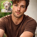 A close-up of a thoughtful brown dog with expressive eyes sitting on a wooden deck surrounded by lush green foliage, basking in the warm sunlight.