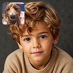 A delightfully fluffy brown puppy fills the frame with an enormous curious nose, soulful eyes, and a tiny heart-shaped tag, looking like it has just leaned in to personally inspect the camera. Cozy blankets and a plush toy make the background feel like a professional nap headquarters.