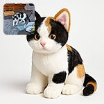 A curious calico cat is caught mid-step on a cozy, fluffy gray blanket draped over a couch, with a wooden drawer and various household items in the background, looking like it's ready to pounce on the next adventure.