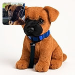 A slightly blurry but adorable puppy sitting in the passenger seat of a car, wrapped in a green blanket, with a scenic view of trees and grass visible through the window.