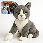 A regal grey and white cat lounges comfortably on a soft blanket with a cozy living room background adorned with warm fairy lights, creating a relaxed and inviting atmosphere.