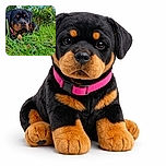 A focused Rottweiler puppy lounges in vibrant green grass with a curious and thoughtful expression, framed by a lush natural background and a bright blue sky.