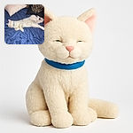 A fluffy white cat is blissfully napping on a soft blue blanket, surrounded by cozy pillows with intricate patterns, looking like the ultimate nap champion in a comfy indoor setting.