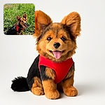 A happy small dog with a red harness sits on lush green grass near a body of water, tongue out and ears perked, enjoying a sunny day outdoors.