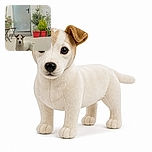 A curious little dog stands at the doorway like a tiny security guard, staring through the glass while potted plants and patio furniture create a cozy garden scene behind it.