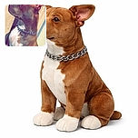 A proud dog wearing a shiny chain collar poses in profile against a textured wall, soaking up the sunlight with a calm and noble expression.