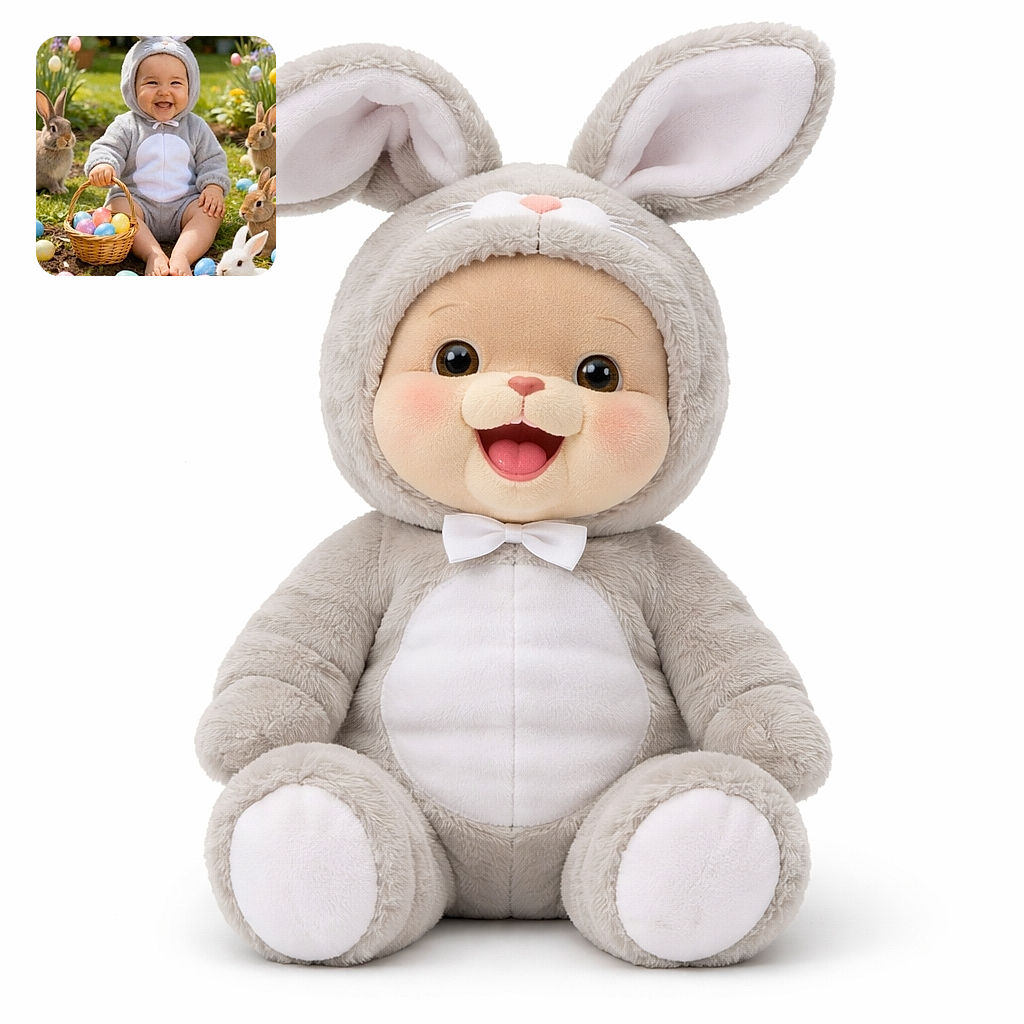 A joyful baby dressed in a fluffy bunny costume sits on the grass surrounded by colorful Easter eggs and several real rabbits, creating an adorable and festive springtime scene.