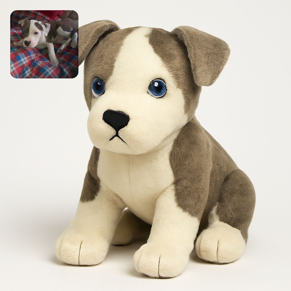A blurry but adorable puppy lounges on a colorful plaid blanket, looking curiously at the camera with a heart-shaped nose spot adding extra charm.