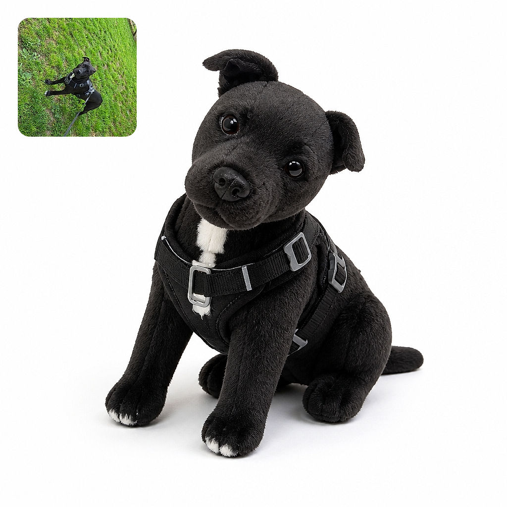 A curious black dog in a harness tilts its head at the camera as if trying to decode the human language, while its leash makes a dramatic runway across the grass. The sideways composition gives the whole park scene a delightfully playful wobble.