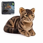 Two cats are lounging in a spacious playpen surrounded by colorful toys, a patterned mat, and a suspiciously cheerful green gadget. The orange cat appears to be inspecting the merchandise while the darker cat has fully embraced nap mode.