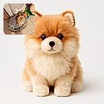 A fluffy little dog sits adorably in a cozy gray pet bed, looking up with big, curious eyes. The scene is set on a tiled floor near a colorful children's chair with a stuffed animal, casting a cute shadow that almost looks like a cat's silhouette on the wall.