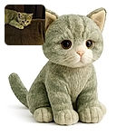 A small gray kitten is lounging on a textured brown cushion with a dark curtain backdrop, looking curiously ahead with its paws stretched out, capturing a cozy and intimate moment.