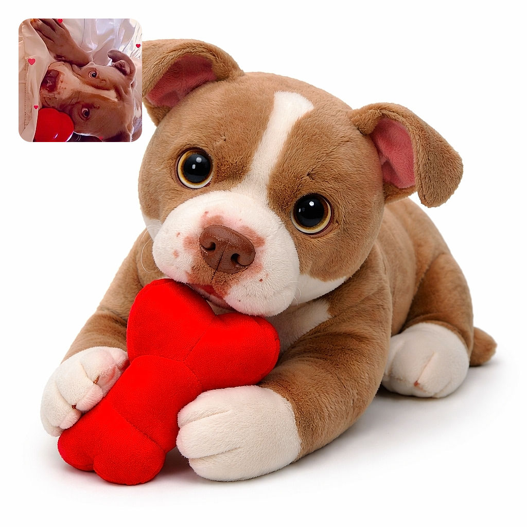 A dog lies cozily on a bed with white sheets, clutching a bright red bone-shaped toy. The photo is decorated with small red heart graphics floating around, adding a cute and affectionate vibe to the scene.