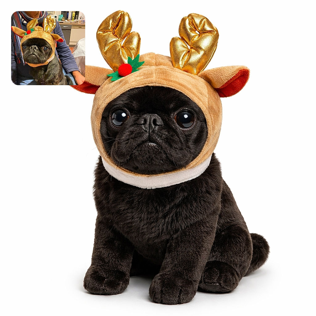 A grumpy little pug wearing sparkly reindeer antlers sits on a person's lap like it reluctantly agreed to holiday photos — eyes wide, chin up, plotting its escape while the human smiles off-frame in a cozy kitchen.