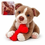 A charming dog is cozily nestled in white bedding, clutching a bright red bone-shaped toy. The photo is adorned with cute red heart graphics floating around, adding a touch of love and warmth to the scene.