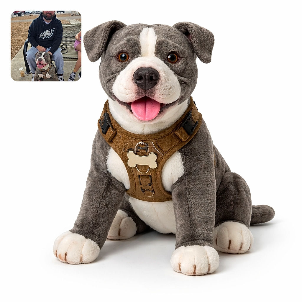 A grin-first pitbull steals the spotlight, sitting proudly between the owner's legs on a park bench — tongue out, harness snug, and eyes begging for snacks while the bearded man in a hoodie smiles behind him; parking lot, mountains, and a stray iced coffee cup complete the scene.