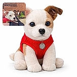 A charming puppy wearing a red harness is being held lovingly by a person outside a brick building with a sign reading 'WATERSIDE Thai Restaurant'. The pup's curious eyes and floppy ears steal the show against a sunny blue sky backdrop and neatly trimmed greenery.