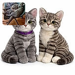 Two tabby cats are cozily intertwined on a black office chair, one peacefully sleeping while the other looks curiously at the camera, creating a heartwarming scene of feline friendship and comfort.