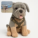 A large dog with a harness is standing on dirt in front of a weathered blue wooden boat and a gray paneled wall, looking tired with its tongue hanging out as if it just finished a big adventure.